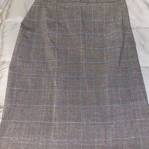 Hip fitted skirt, goes to knees.